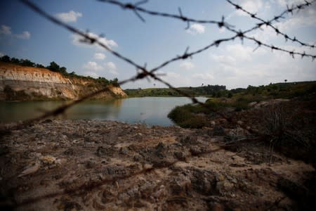 A used coal mining pit now filled with water is pictured in Kutai Kertanegara regency