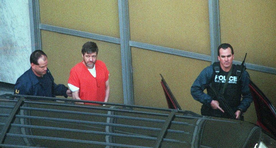 Theodore Kaczynski is led from the Federal Courthouse in Sacramento, Calif., Thursday, Jan. 22, 1998, after he pleaded guilty to being the Unabomber. Kaczynski died in prison, officials said June 10, 2023.