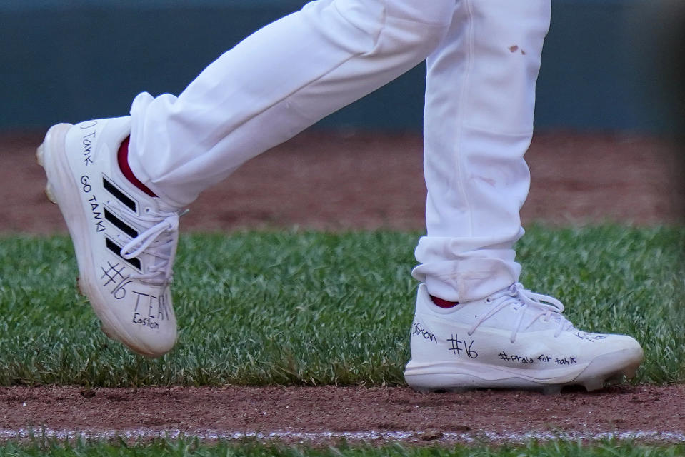 Santa Clara, Utah's Brogan Oliverson has writing on his shoes in support of his brother Easton, who was injured when he fell out of his bunk, following a baseball game against Nolensville, Tenn., in which Brogan took his brother's place on the team at the Little League World Series in South Williamsport, Pa., Friday, Aug. 19, 2022. Tennessee won 11-2. (AP Photo/Gene J. Puskar)