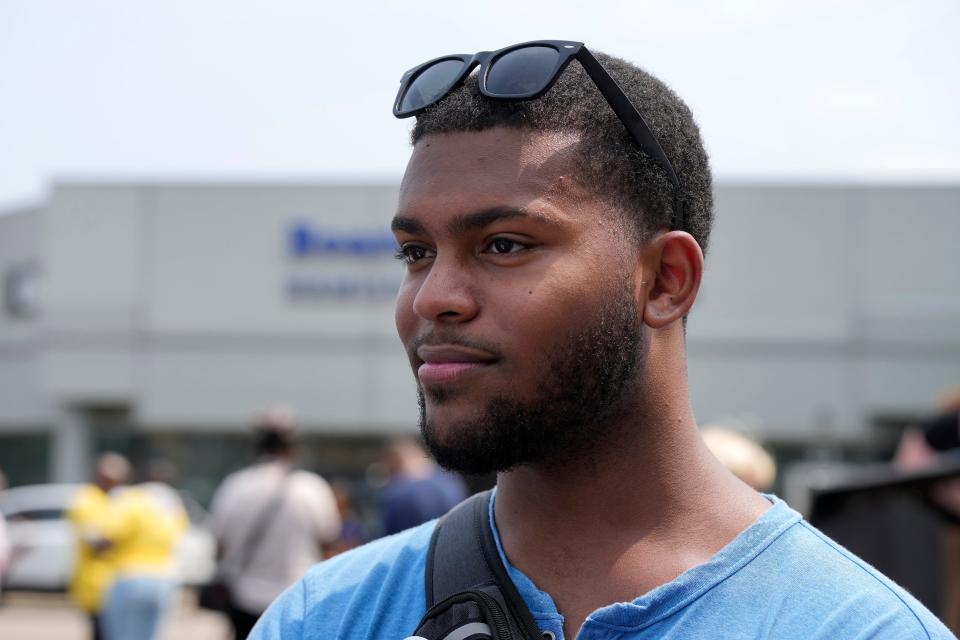 Antonio Sanders, 19, of Cincinnati, discusses Issue 1 near the Hamilton County Board of Election after a One Person One Vote rally on July 18. “It’s going to shred our democracy into pieces,” Sanders said. “It’s a last-ditch effort by Republicans to stay in power.”