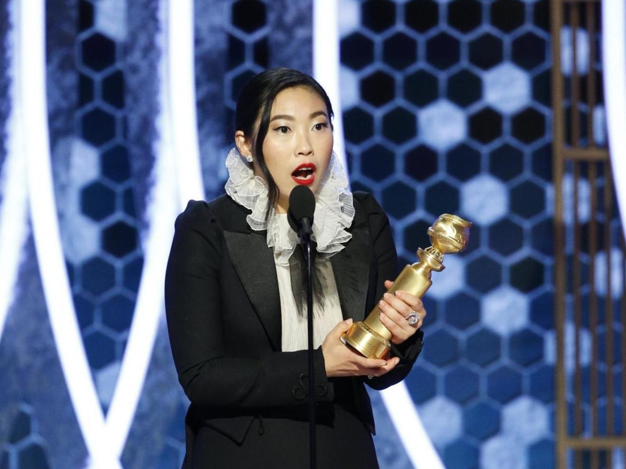 Awkwafina onstage at the Golden Globes 2020: Getty