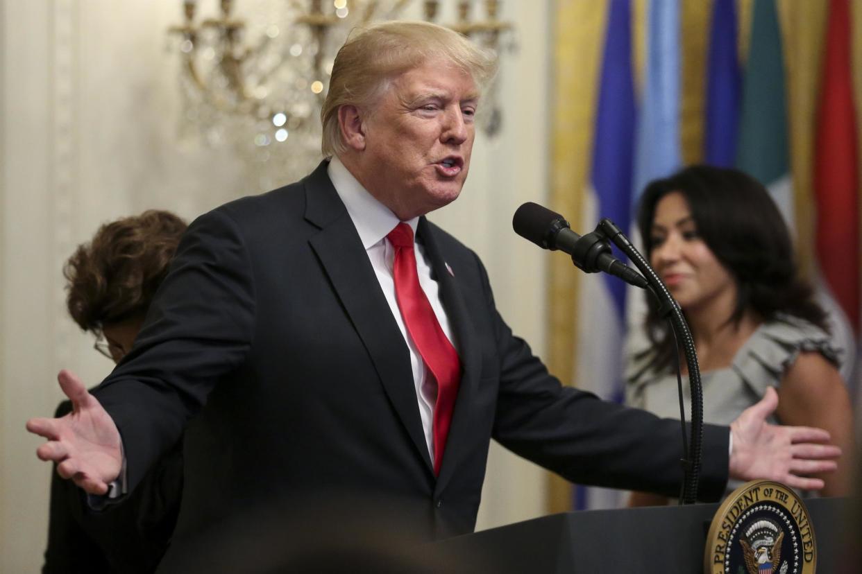 President Donald Trump speaks during the Hispanic Heritage Month Celebration in the East Room of the White House: Getty