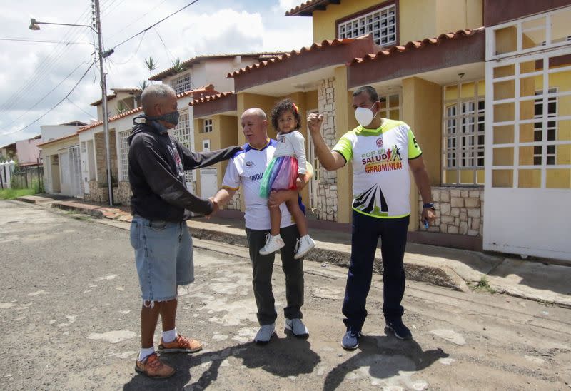 Trade union leader Ruben Gonzalez, speaks with friends outside his house after being released from prison due to Venezuela's president Nicolas Maduro pardon, in Puerto Ordaz