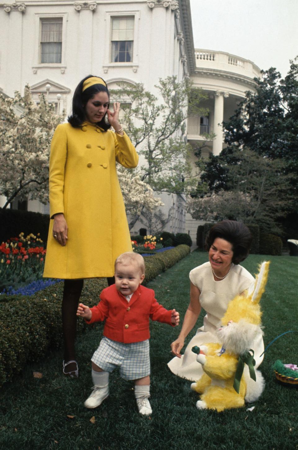 <p>Lady Bird Johnson, right, is shown at the White House Rose Garden with grandson Patrick Lyndon Nugent, Lynda Bird Robb and an Easter Bunny. (Photo: Bettmann/Getty Images) </p>