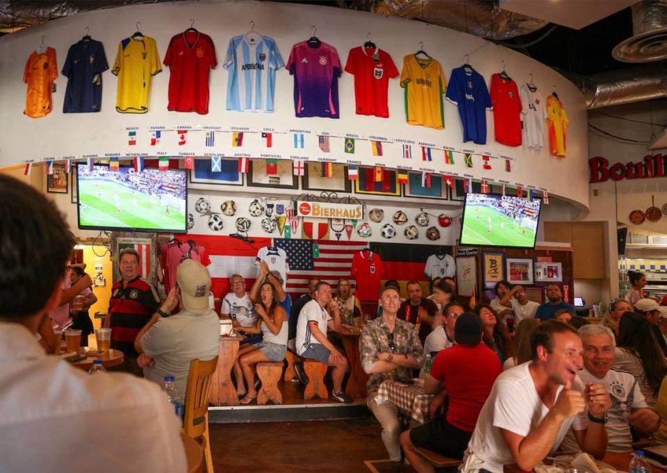 Soccer fans react to Switzerland’s goal as they gathered at the packed Fritz & Fratz Bierhaus on Sunday.