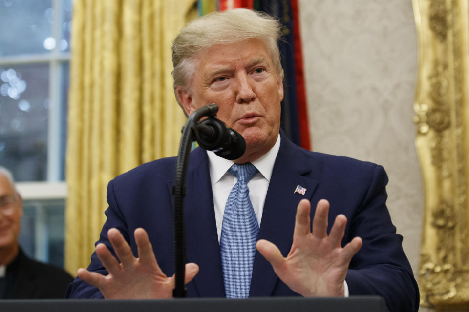 President Donald Trump speaks during a ceremony to present the Presidential Medal of Freedom to former Attorney General Edwin Meese, in the Oval Office of the White House, Tuesday, Oct. 8, 2019, in Washington. (AP Photo/Alex Brandon)