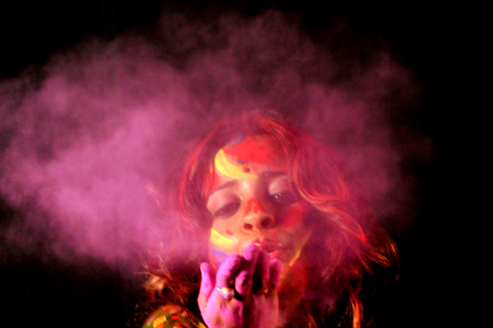 <p>An Indian girl celebrates Holi on Feb. 27, 2018 in Kolkata. The popular Hindu spring festival of colors is observed in India at the end of the winter season on the last full moon of the lunar month, and will be celebrated on March 1 this year. (Photo: Debajyoti Chakraborty/NurPhoto via Getty Images) </p>