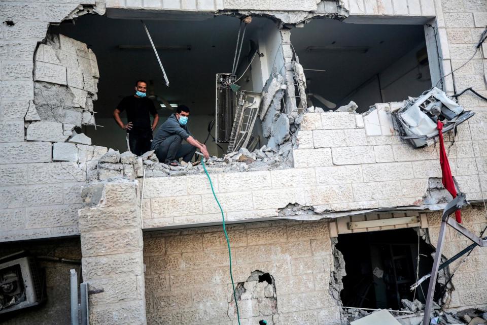 PHOTO: Palestinians are inspecting the debris of the Jaffa Hospital in Deir el-Balah, in the central Gaza Strip, on Dec. 8, 2023, amid continuing battles between Israel and Hamas.  (Majdi Fathi/NurPhoto via AP, FILE)