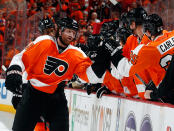 PHILADELPHIA, PA - APRIL 22: Scott Hartnell #19 of the Philadelphia Flyers celebrates his goal with teammates at the bench in the first period of Game Six of the Eastern Conference Quarterfinals against the Pittsburgh Penguins during the 2012 NHL Stanley Cup Playoffs at Wells Fargo Center on April 22, 2012 in Philadelphia, Pennsylvania. (Photo by Paul Bereswill/Getty Images)