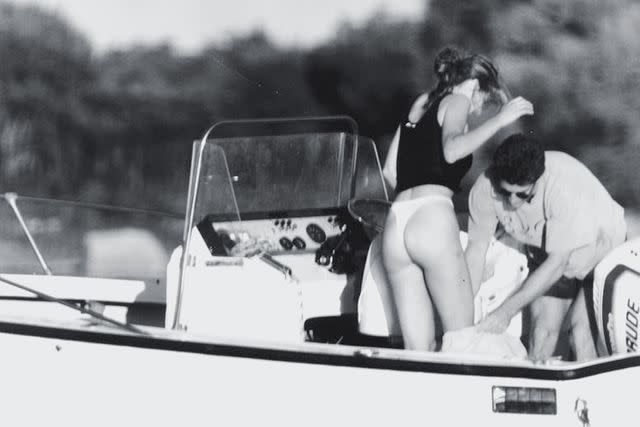 <p>John Roca/NY Daily News Archive via Getty</p> Carolyn and John boating in Martha's Vineyard