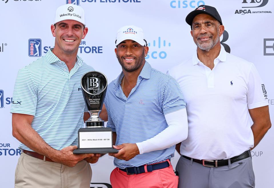 Willie Mack III (center) won the Billy Horschel APGA Tour Invitational on May 6, for the second year in a row. Horschel is on the left and APGA CEO Ken Bently is on the right.