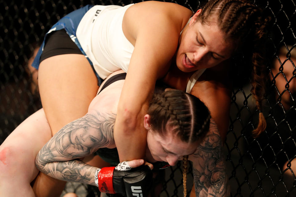 ROCHESTER, NY - MAY 18:  (L-R) Felicia Spencer of Canada attempts to secure a rear choke submission against Megan Anderson of Australia in their women's featherweight bout during the UFC Fight Night event at Blue Cross Arena on May 18, 2019 in Rochester, New York. (Photo by Michael Owens/Zuffa LLC/Zuffa LLC via Getty Images)