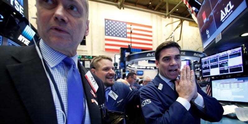 Traders work on the floor of the New York Stock Exchange (NYSE) in New York City, U.S. November 16, 2016.  REUTERS/Brendan McDermid 