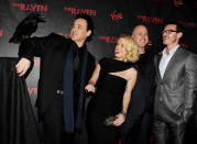 <p class="MsoNormal">The publicists for the Edgar Allan Poe murder mystery “The Raven” didn’t miss an opportunity to promote the movie via the actual bird that shares the title. The animal posed with the film’s lead John Cusack, who was joined by (L-R) co-star Alice Eve, director James McTeigue, and co-star Luke Evans at the premiere in downtown Los Angeles Monday night. (4/23/2012)</p>