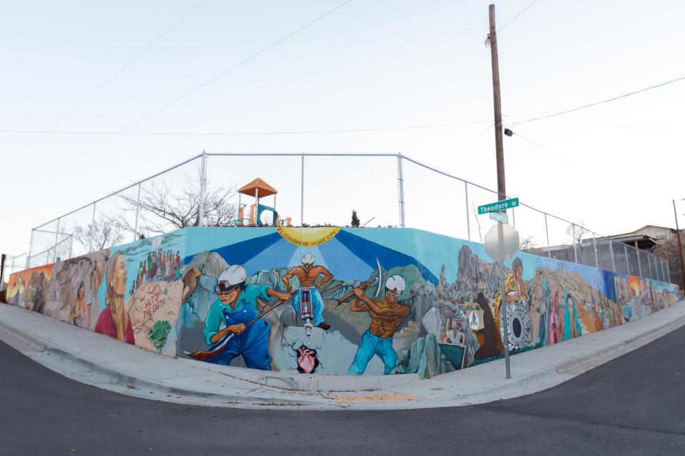 With the help of other artists and the community, El Paso-born artist Carlos Callejo painted the mural depicting the history of Silver City at a municipal park on the corner of Theodore and Richard Streets. The mural is located in Chihuahua Hill, the town's oldest Mexican American neighborhood.