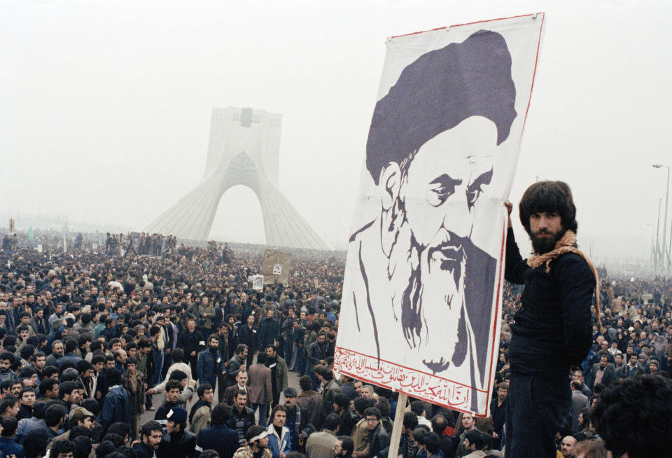 FILE - In this Oct. 9, 1978 file photo, Iranian protesters demonstrate against Shah Mohammad Reza Pahlavi in Tehran, Iran. Forty years ago, Iran's ruling shah left his nation for the last time and an Islamic Revolution overthrew the vestiges of his caretaker government. The effects of the 1979 revolution, including the takeover of the U.S. Embassy in Tehran and ensuing hostage crisis, reverberate through decades of tense relations between Iran and America. (AP Photo, File)