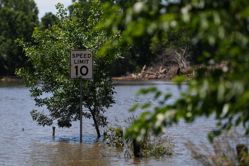 The Big Sioux overflows into a local park on Monday, June 24, 2024, at Chautauqua Park in Canton, South Dakota.