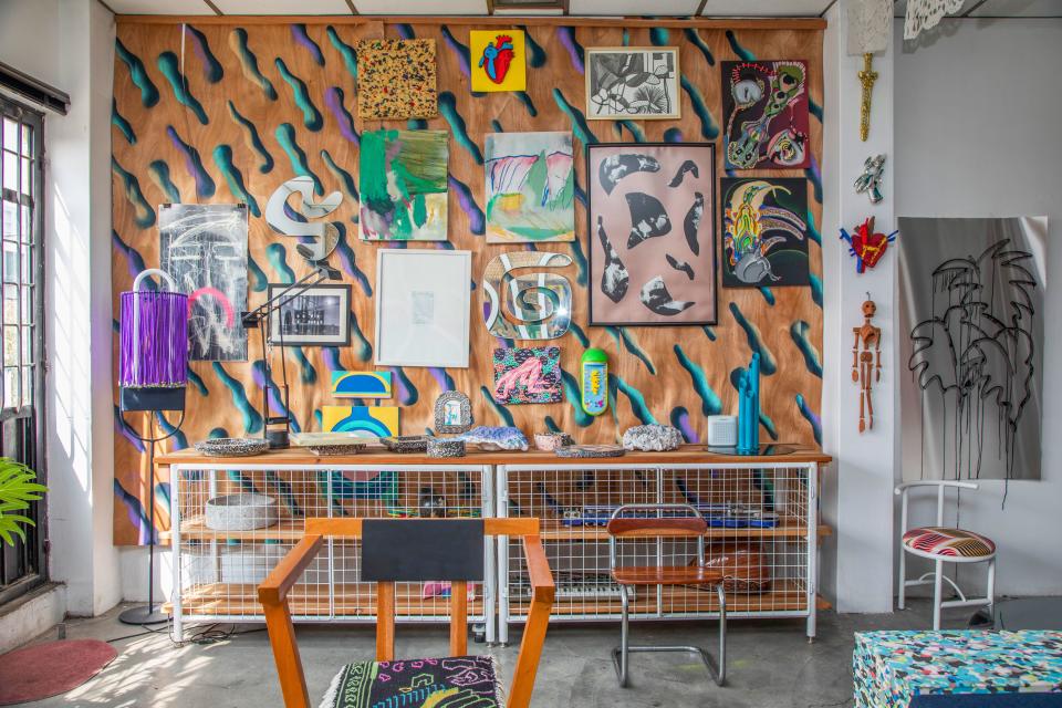 Clemence’s favorite area of the apartment? Her patterned-wood gallery wall, which showcases work by friends and collaborators. “Collaboration is in my studio’s DNA,” she says.