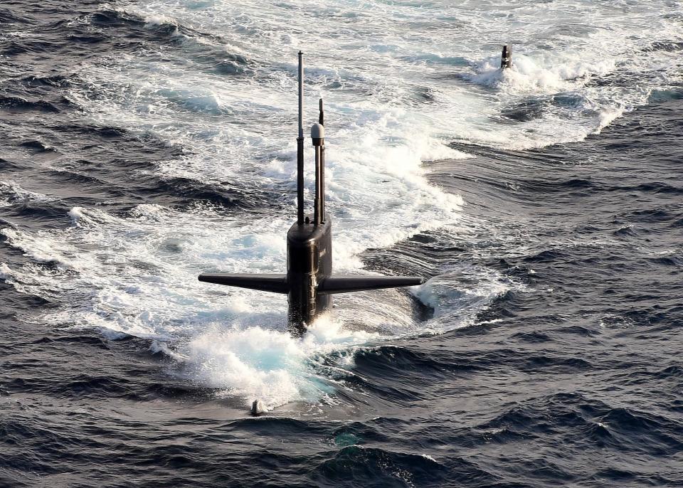 The Los Angeles-class attack submarine USS Helena transits the Atlantic Ocean.