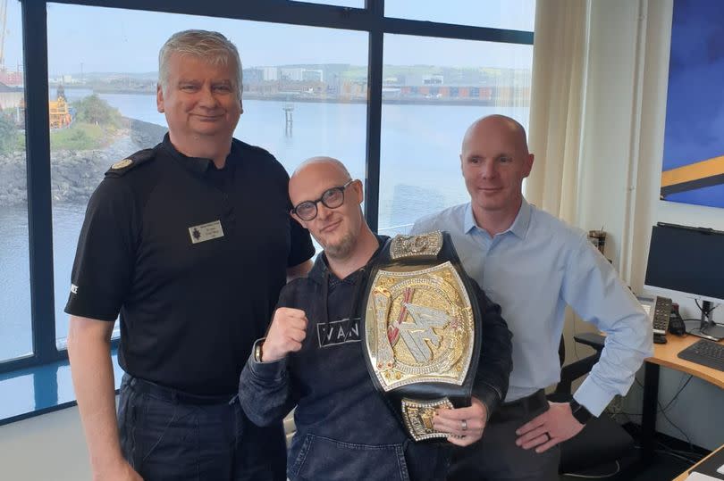 Barry Leckey receiving his customised WWE belt back on Friday morning