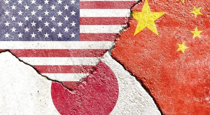 A concept image of the flags of the United States, China, and Japan juxtaposed on concrete slabs jutting into each other.