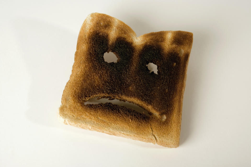 A slice of burnt toast with a sad face; employment law mistakes