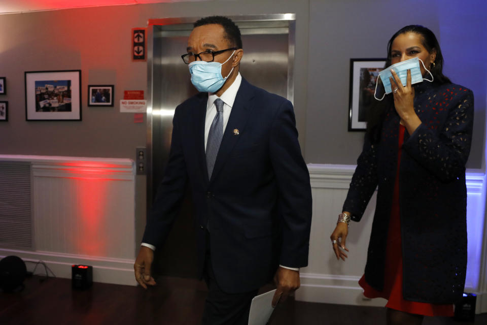 Democrat Kweisi Mfume, left, arrives with his wife, Tiffany Mfume, at an election night news conference at his campaign headquarters after he won the 7th Congressional District special election, Tuesday, April 28, 2020, in Baltimore. Mfume defeated Republican Kimberly Klacik to finish the term of the late Rep. Elijah Cummings, retaking a Maryland congressional seat Mfume held for five terms before leaving to lead the NAACP. All voters in the 7th Congressional District were strongly urged to vote by mail in an unprecedented election dramatically reshaped by the coronavirus pandemic. (AP Photo/Julio Cortez)