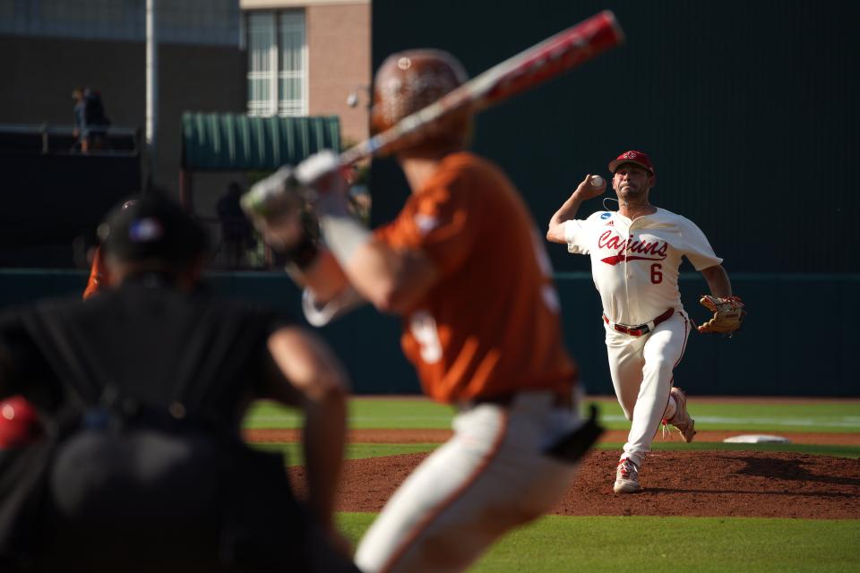 Louisiana Ragin Cajuns pitcher David Christi (6) throws against Texas Longhorns infielder Jared Thomas (9) during the first round in the NCAA baseball College Station Regional May 31, 2024, at Olsen Field College Station.