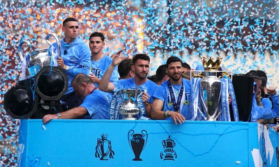 Manchester City celebrating the 2022-23 treble