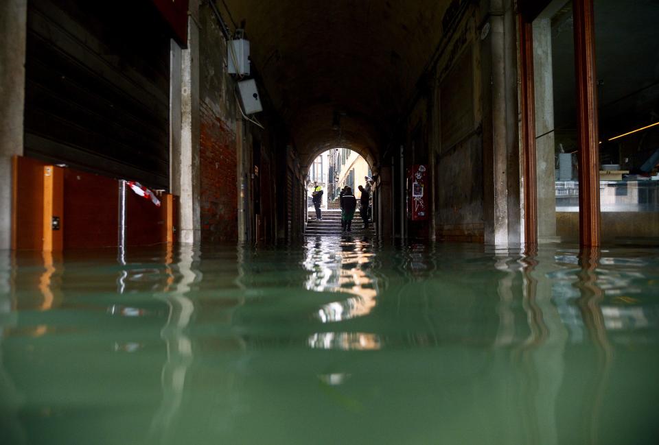 A flooded alleyway is pictured on November 15, 2019 in Venice, two days after the city suffered its highest tide in 50 years. - Flood-hit Venice was bracing for another exceptional high tide on November 15, as Italy declared a state of emergency for the UNESCO city where perilous deluges have caused millions of euros worth of damage. (Photo by FILIPPO MONTEFORTE/AFP via Getty Images)