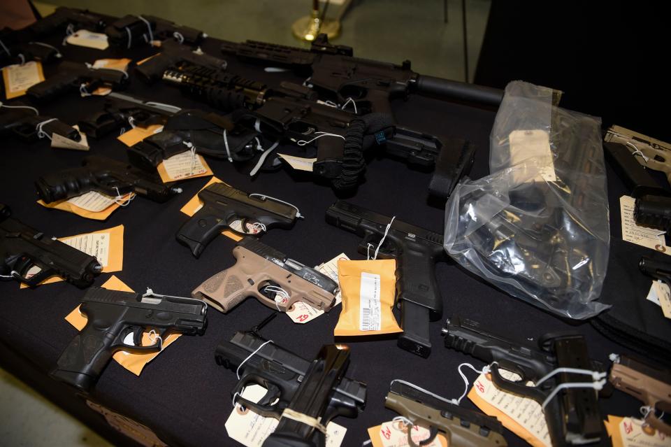 Firearms seized as a part of Operation Grace sit on tables during the Operation Grace press conference at the Richmond County Sheriff's Office South Precinct on Wednesday, Sept. 21, 2022. During Operation Grace, police officers seized 176 guns and large quantities of drugs.