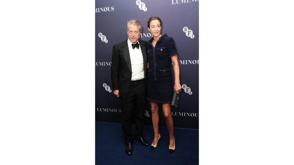 couple posing on red carpet