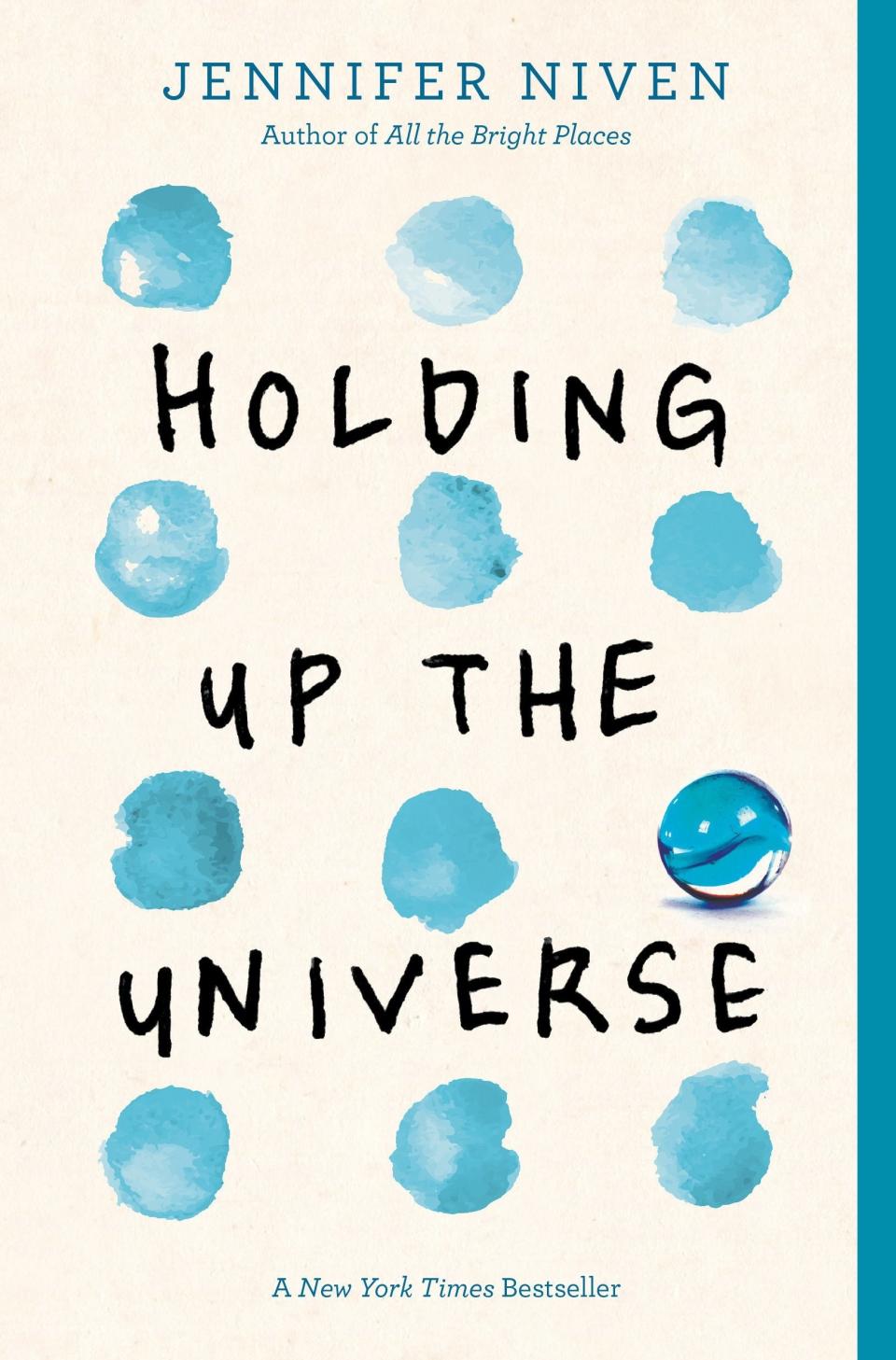 Cover shows lines of blue watercolor dots with title text in the center