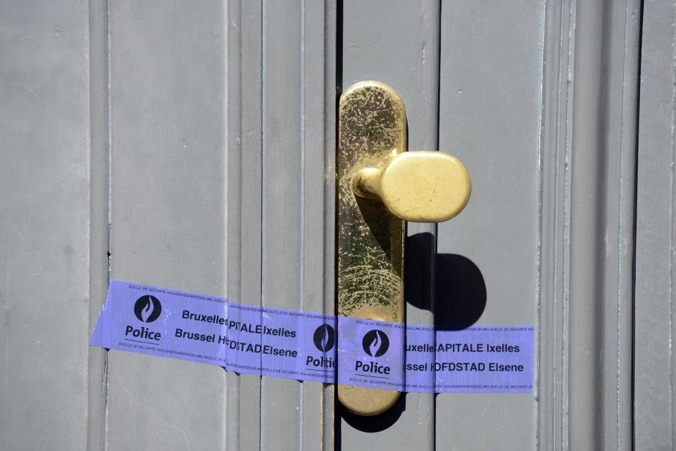 A police tape is seen over the entrance of the Jewish Museum, the site of a shooting incident, in central Brussels