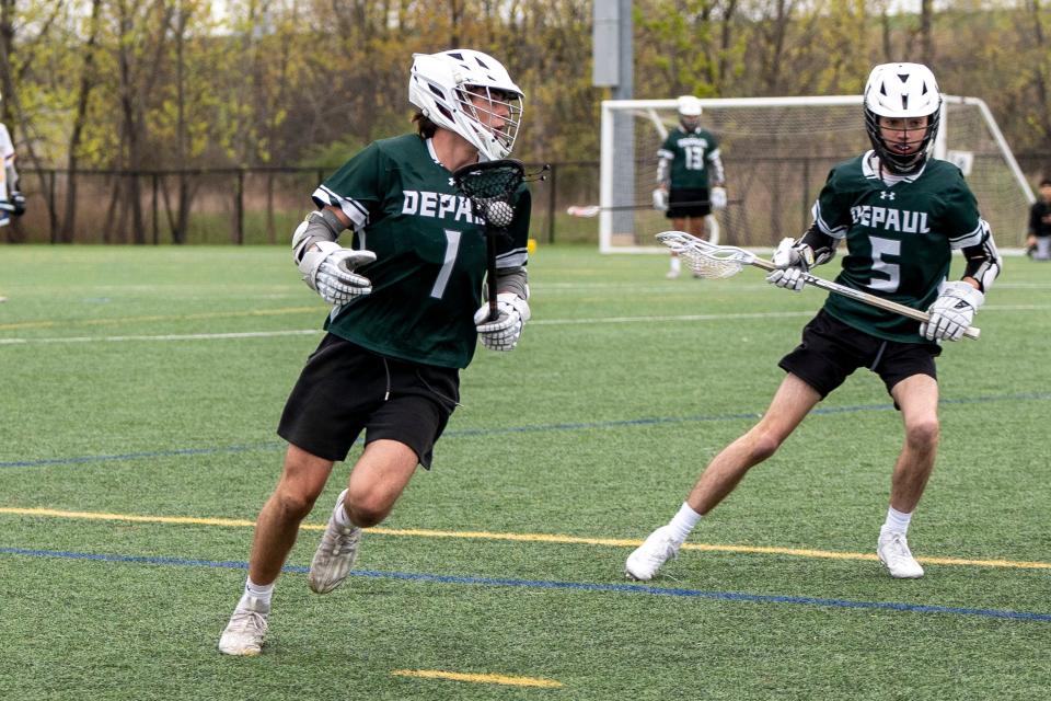 Apr 18, 2024; Lyndhurst, NJ; Lyndhurst boys lacrosse hosts DePaul on Thursday afternoon. D #1 Cody Webster and D #5 JP Garrison.