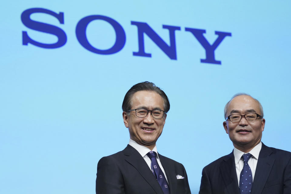 Hiroki Totoki, right, the Chief Financial Officer, who will become the new president and COO, Sony Corp. and Kenichiro Yoshida, left, chief executive officer of Sony Corp. pose for media after a press conference Thursday, Feb. 2, 2023, in Tokyo. (AP Photo/Eugene Hoshiko)