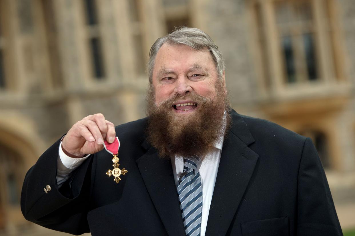 Actor Brian Blessed after he is made an Officer of the Order of the British Empire (OBE) by Queen Elizabeth II during an Investiture ceremony at Windsor Castle.