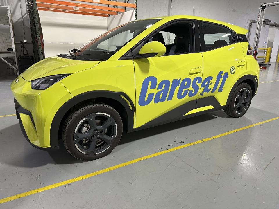 A BYD Seagull electric vehicle is displayed at the Caresoft Global facility Wednesday, April 3, 2024, in Livonia, Mich. Caresoft President Terry Woychowski, a former engineer at General Motors, said the Seagull represents a "clarion call" for the U.S. auto industry. (AP Photo/Mike Householder)