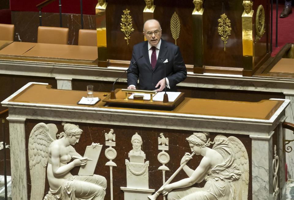 France's Prime Minister Bernard Cazeneuve speaks at the National Assembly in Paris, Tuesday, Dec. 13, 2016. France's new Prime Minister Bernard Cazeneuve has given his first speech to parliament, arguing for an extension of a year-old state of emergency to keep France secure through presidential elections. (AP Photo/Michel Euler)