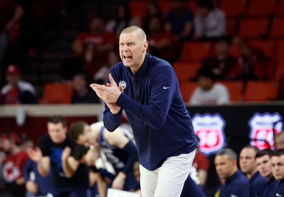 Brigham Young coach Mark Pope watches his team play against Oklahoma during their game at Lloyd Noble Center.