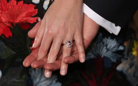 Princess Eugenie's padparadscha sapphire and diamond engagement ring - Credit: Jonathan Brady/PA Wire