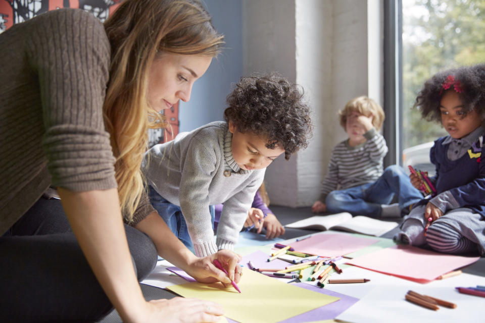 teacher working with small children