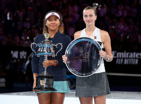 Tennis - Australian Open - Women's Singles Final - Melbourne Park, Melbourne, Australia, January 26, 2019. Japan's Naomi Osaka and Czech Republic's Petra Kvitova pose with their trophies. REUTERS/Lucy Nicholson