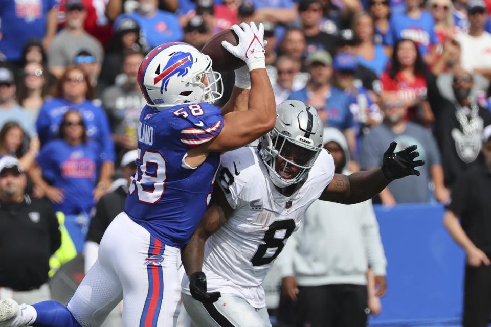 Buffalo Bills linebacker Matt Milano (58) intercepts a pass to Las Vegas Raiders' Josh Jacobs (8) during the second half of an NFL football game, Sunday, Sept. 17, 2023, in Orchard Park, N.Y. (AP Photo/Jeffrey T. Barnes)