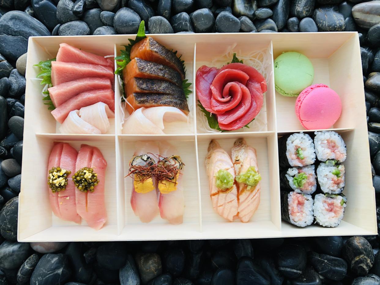 A sushi and sashimi bento at Sushiko. Like the school lunch bento boxes they've inspired, a bento from a sushi restaurant contains single portion sizes of a variety of menu items. (Photo: Daisuke Utagawa/Sushiko)