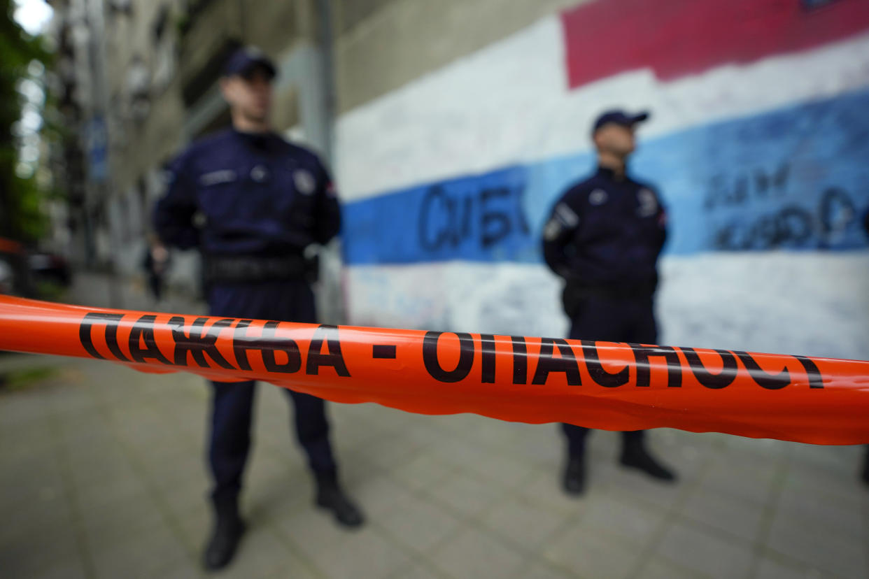 Police block streets around the Vladislav Ribnikar school in Belgrade, Serbia, Wednesday, May 3, 2023. A teenage boy opened fire early Wednesday in a school in central Belgrade, causing injuries. (AP Photo/Darko Vojinovic)