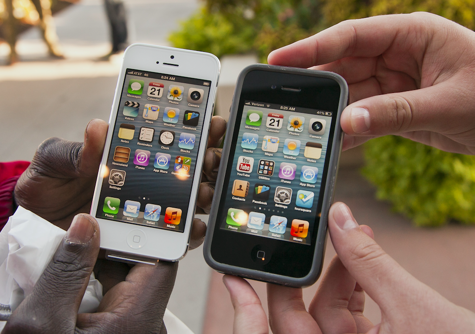 The iPhone 5, left, alongside its predecessor, the iPhone 4s (Picture: Rex)