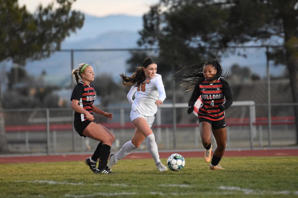 Apple Valley’s Jadyn Bechtel dribbles the ball during the first half against Oak Hills on Friday, Jan. 19, 2024. Apple Valley beat Oak Hills 1-0 and improved to 6-0 in the Mojave River League standings.