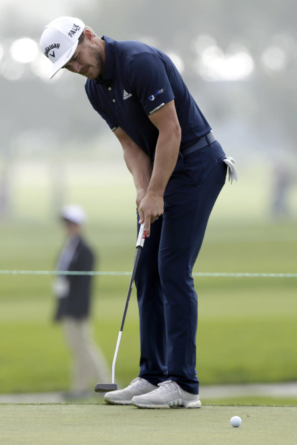 Sebastian Cappelen putts on the 11th tee on the Torrey Pines North Course during the second round of The Farmers Insurance golf tournament in San Diego, Friday, Jan. 24, 2020. (AP Photo/Alex Gallardo)