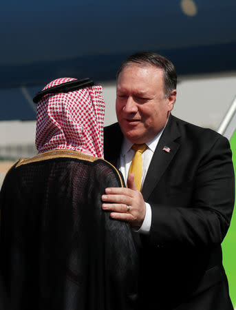 U.S. Secretary of State Mike Pompeo greets Saudi Foreign Minister Adel al-Jubeir after arriving in Riyadh, Saudi Arabia, October 16, 2018. REUTERS/Leah Millis/Pool